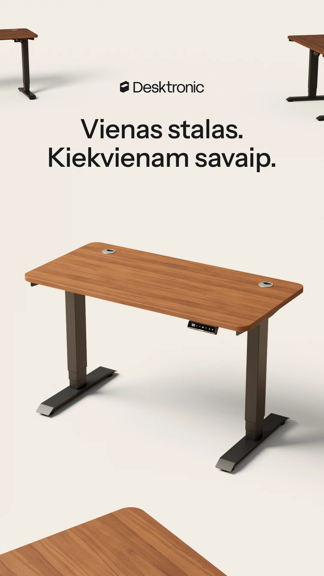 Desktronic HomePro desk on a beige studio floor, framed by more HomePro desks: “Vienas stalas. Kiekvienam savaip.” (One desk. Each their own way.)