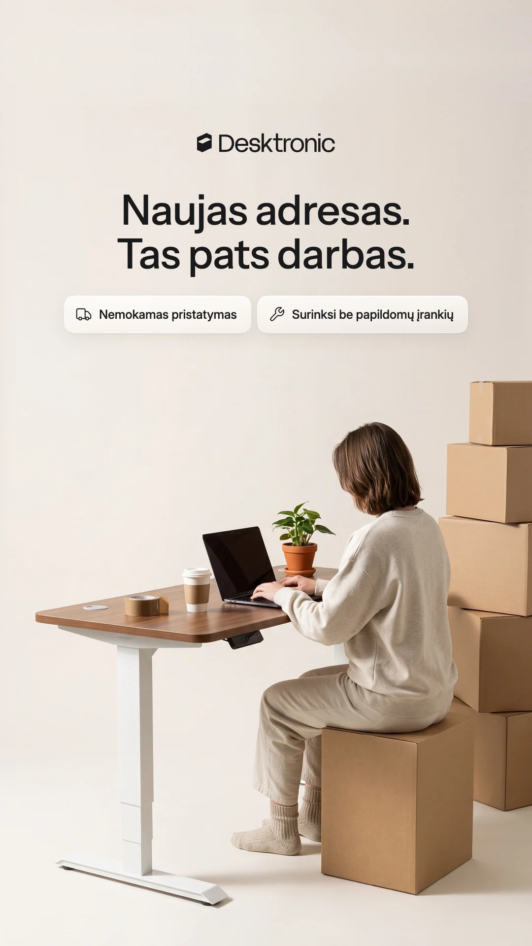 Desktronic ad: a woman working at a HomePro desk among moving boxes, “Naujas adresas. Tas pats darbas.” (New address. Same work.)